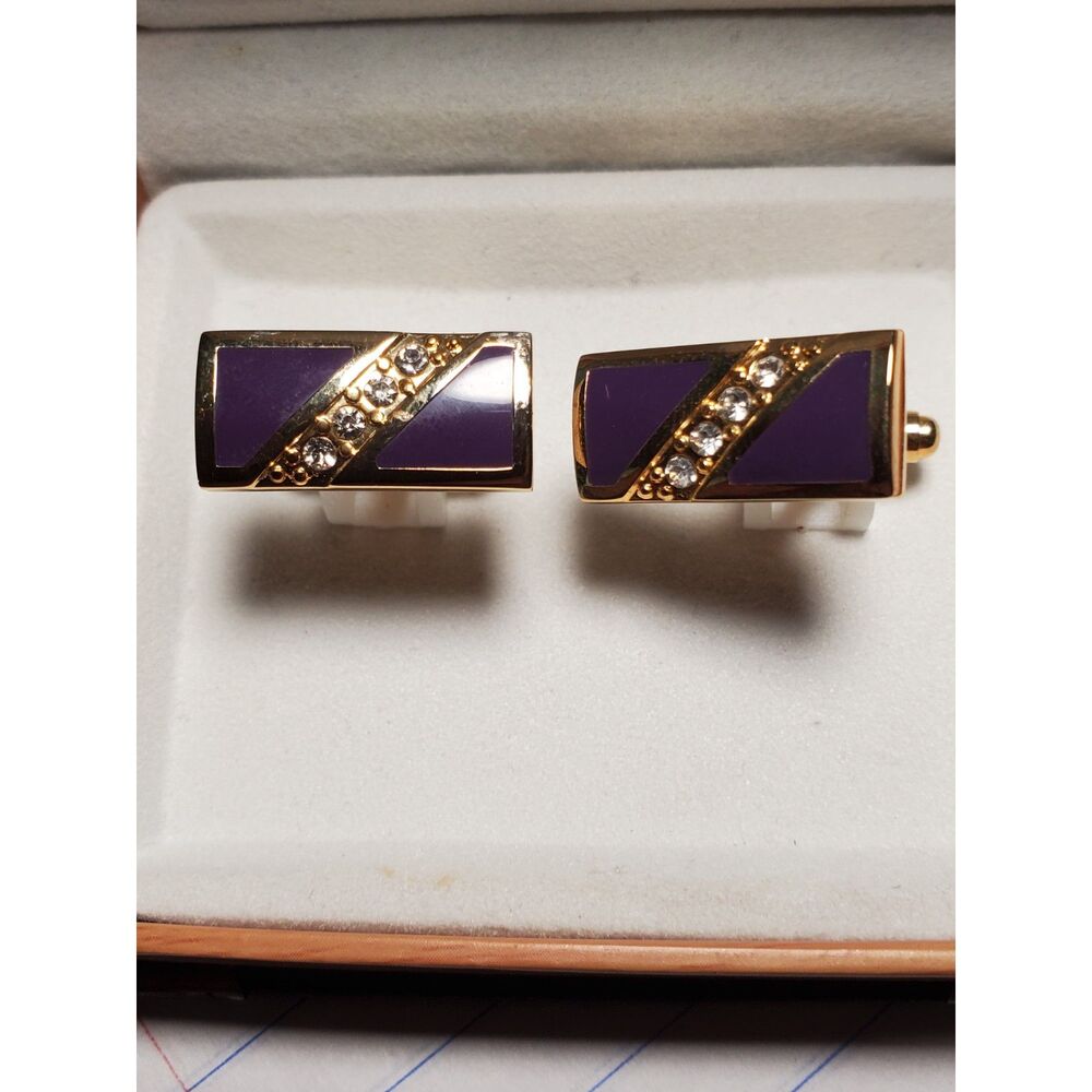 The Cufflinks are gold-toned with purple inlay Great Gift